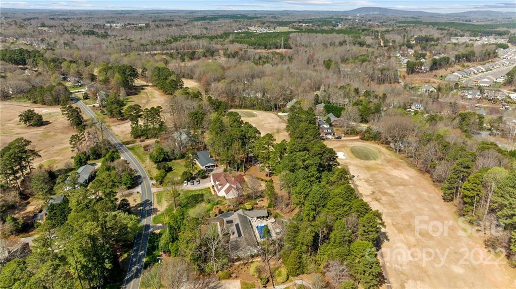 8241 Fairfield Forest Road Denver, NC 28037 - Photo 44 of 48 an aerial view of residential houses with outdoor space