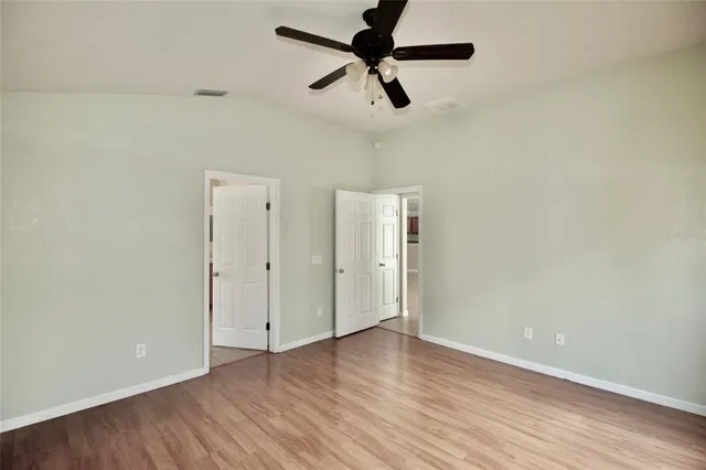 a view of room with hardwood floor