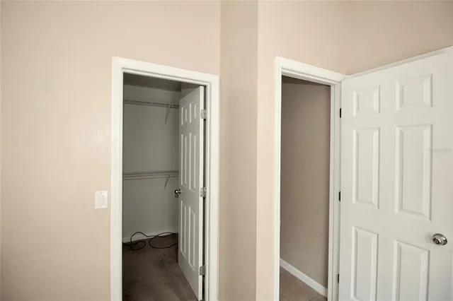 a view of a room with a wardrobe space
