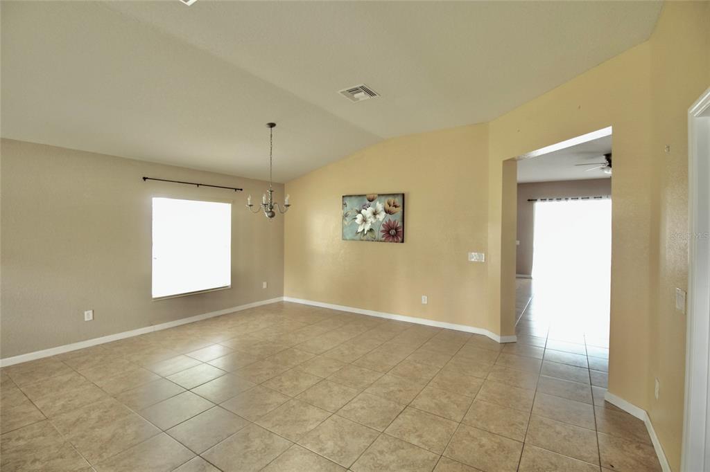5739 Southwest 40th Street Ocala, FL 34474 - Photo 10 of 52 a view of an empty room and window