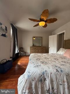 6232 Ridge Avenue Philadelphia, PA 19128 - Photo 4 of 20 a bedroom with a bed and a chandelier