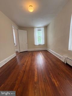 6232 Ridge Avenue Philadelphia, PA 19128 - Photo 10 of 20 an empty room with wooden floor and windows