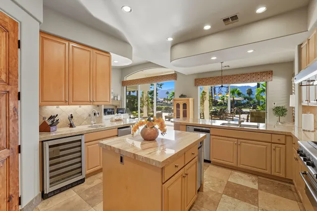 a bedroom with a bed and a fireplace