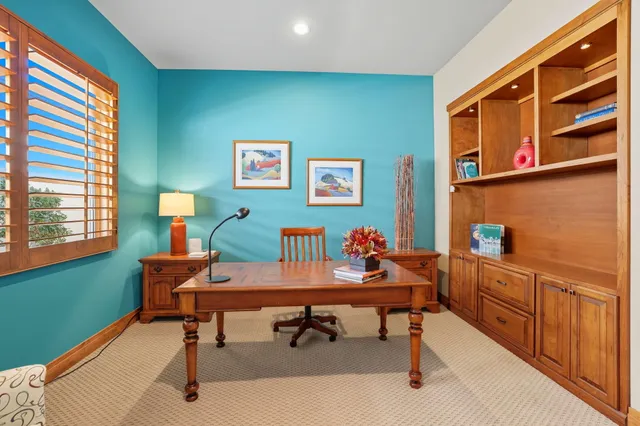 a large spacious bathroom with a large tub and sink