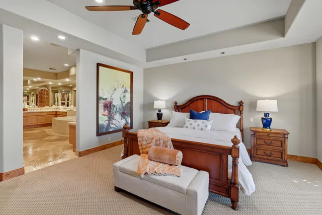 a utility room with cabinets washer and dryer