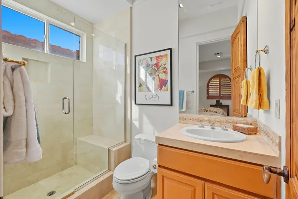 a utility room with cabinets washer and dryer