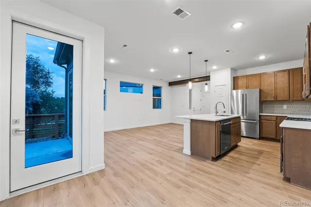 $610,950 | 12311 West 58th Drive, Arvada, CO 80002