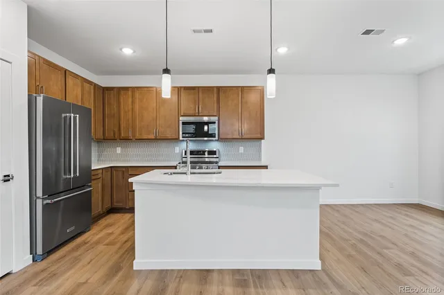 $610,950 | 12311 West 58th Drive, Arvada, CO 80002