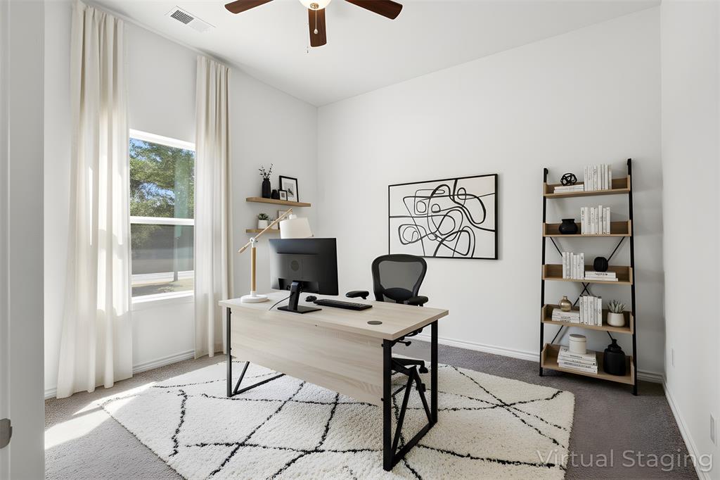 850 County Road Honey Grove, TX 75446 - Photo 13 of 40 a work room with furniture and a window