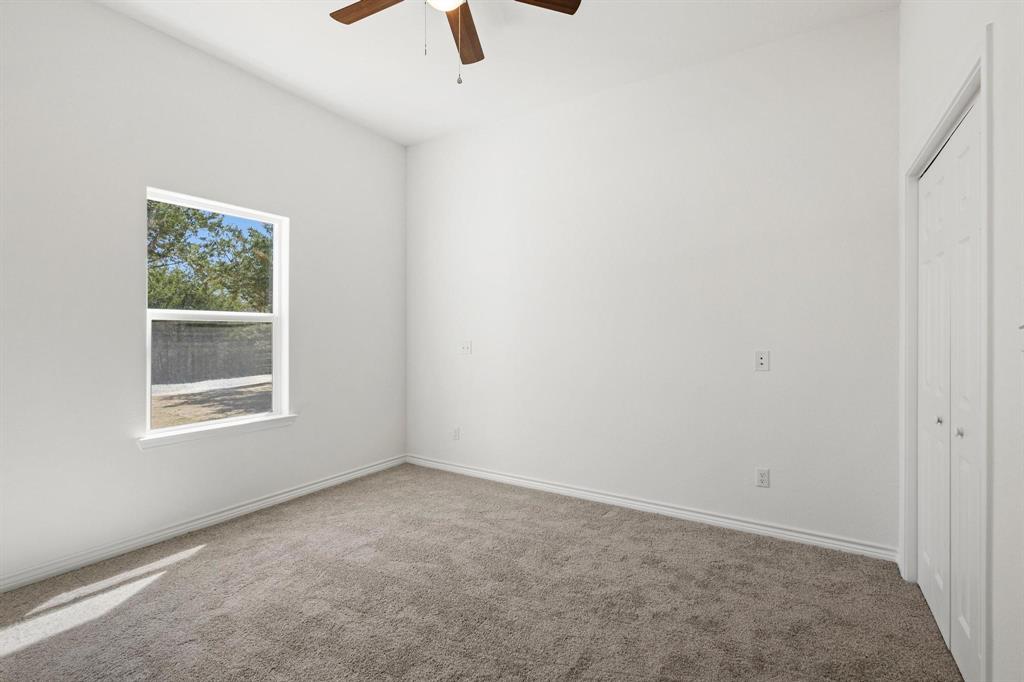 850 County Road Honey Grove, TX 75446 - Photo 27 of 40 an empty room with a window