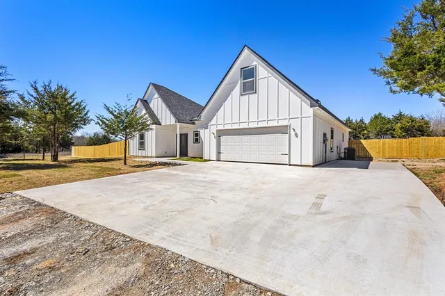 a view of house with swimming pool