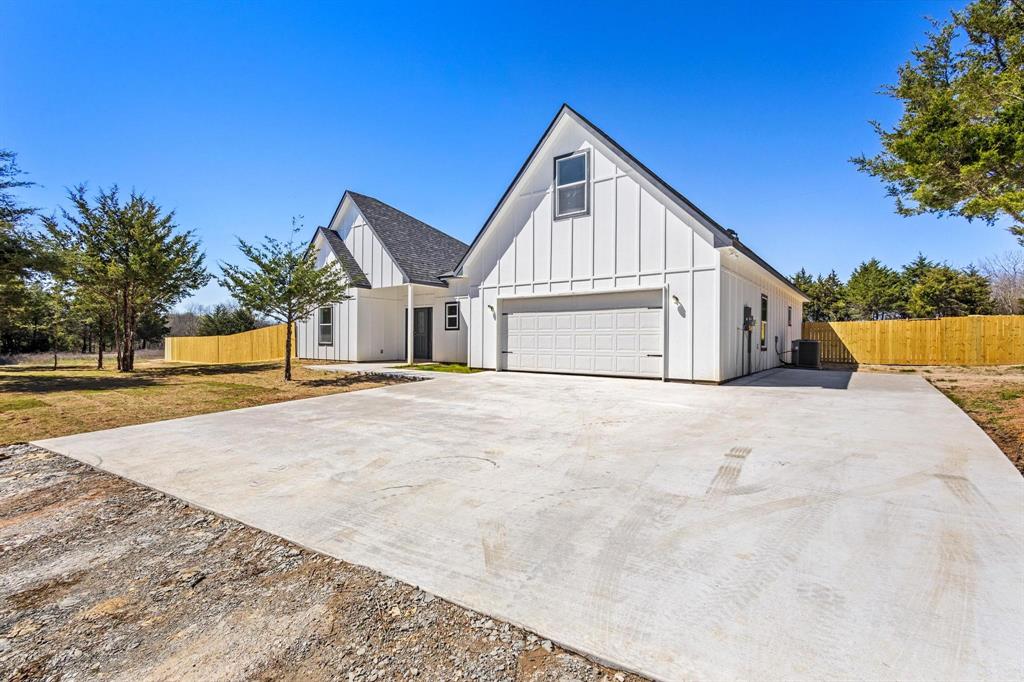 850 County Road Honey Grove, TX 75446 - Photo 34 of 40 a view of house with swimming pool
