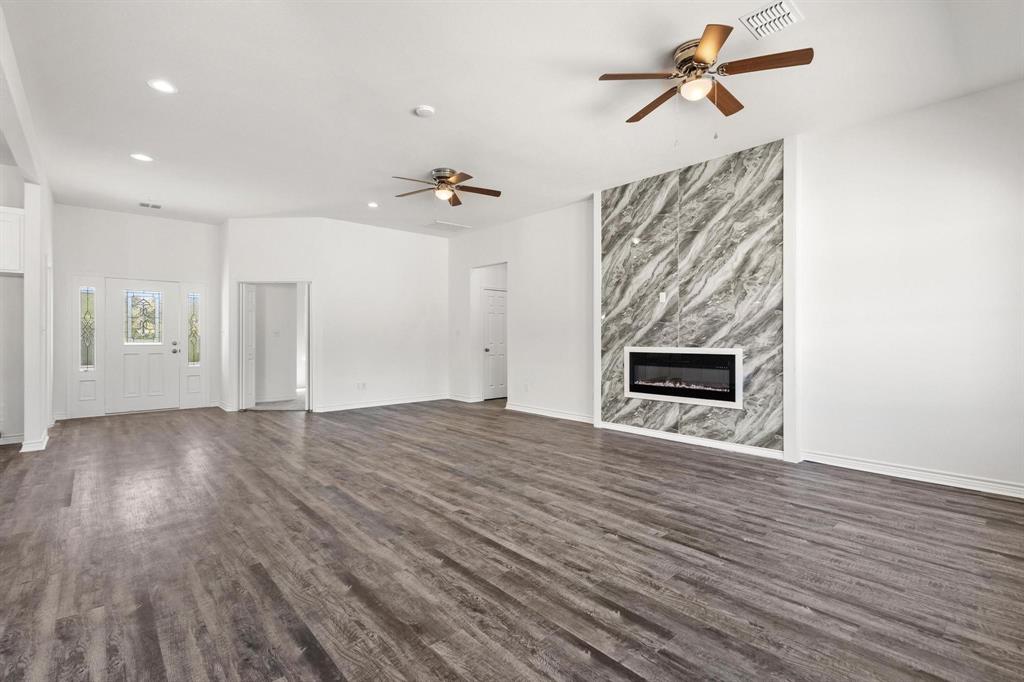 850 County Road Honey Grove, TX 75446 - Photo 4 of 40 a view of a livingroom with a fireplace