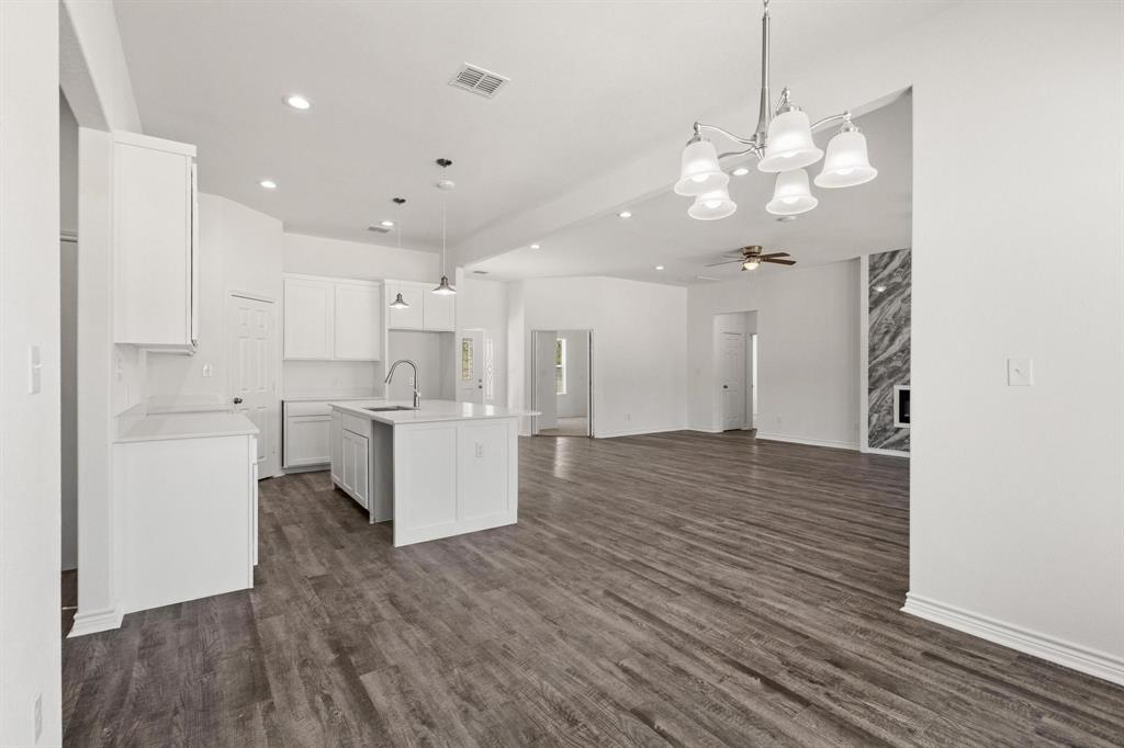 850 County Road Honey Grove, TX 75446 - Photo 10 of 40 a view of kitchen and kitchen with wooden floor