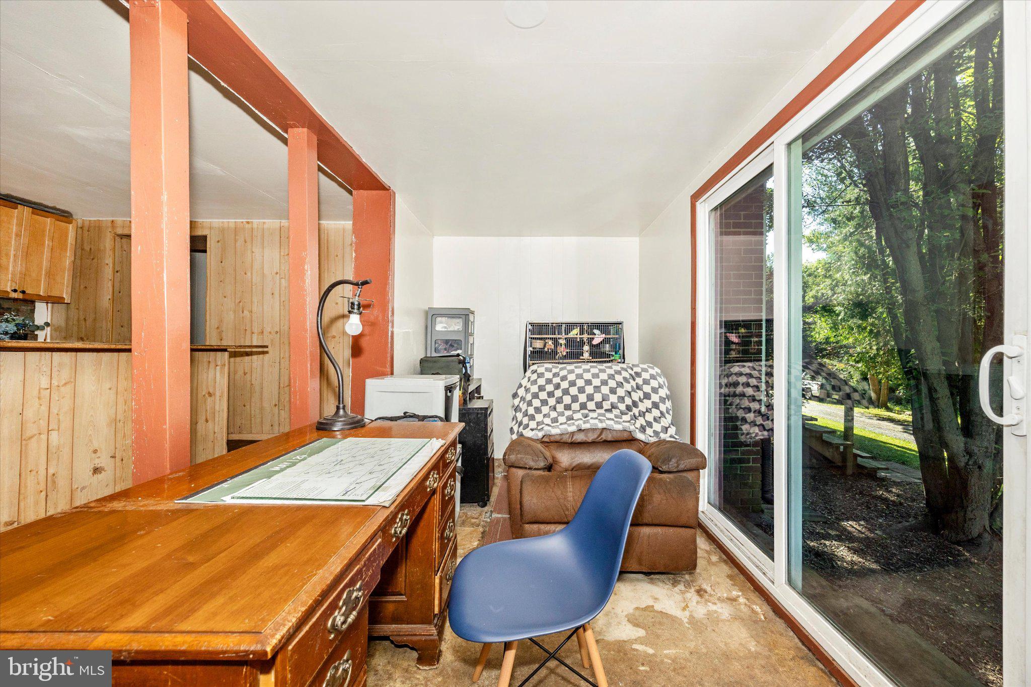 14721 Albert Staub Road Thurmont, MD 21788 - Photo 16 of 46 a room with furniture and a window