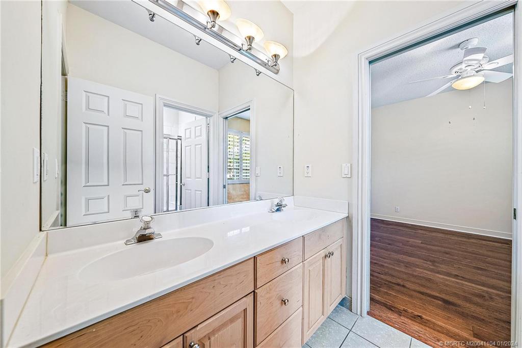 105 Henry Sewall Way Stuart, FL 34996 - Photo 20 of 33 a bathroom with a sink double vanity and a mirror