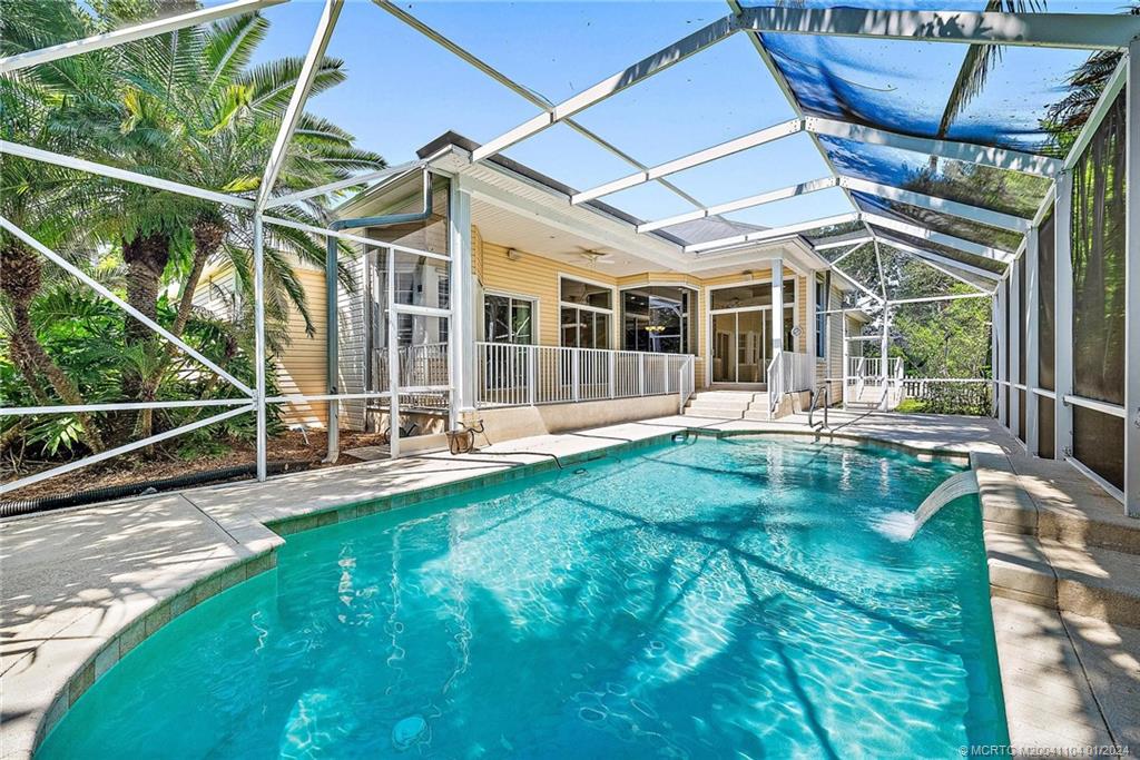 105 Henry Sewall Way Stuart, FL 34996 - Photo 30 of 33 a view of a house with backyard and sitting area