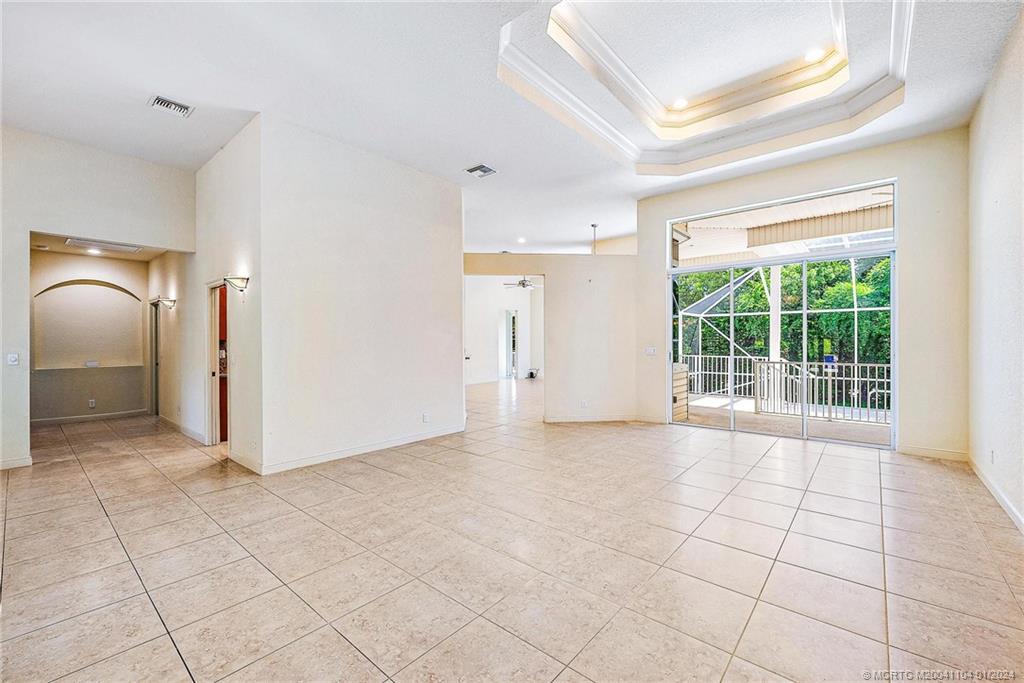 105 Henry Sewall Way Stuart, FL 34996 - Photo 7 of 33 a view of an empty room with a window