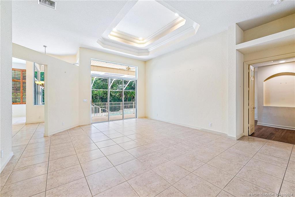 105 Henry Sewall Way Stuart, FL 34996 - Photo 8 of 33 a view of an empty room with a window