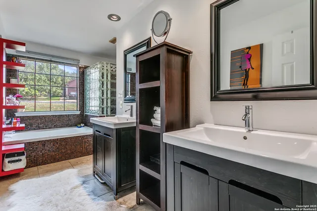 a bathroom with a sink and a bathtub