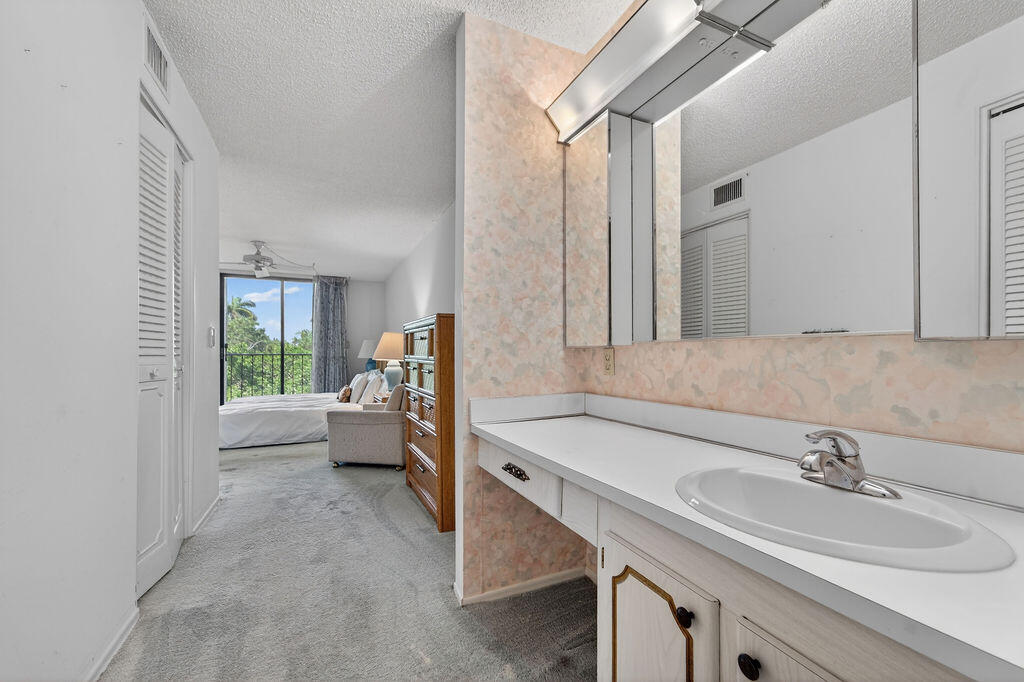 501 Southwest 11th Place, Unit 402A Boca Raton, FL 33432 - Photo 18 of 29 primary vanity2