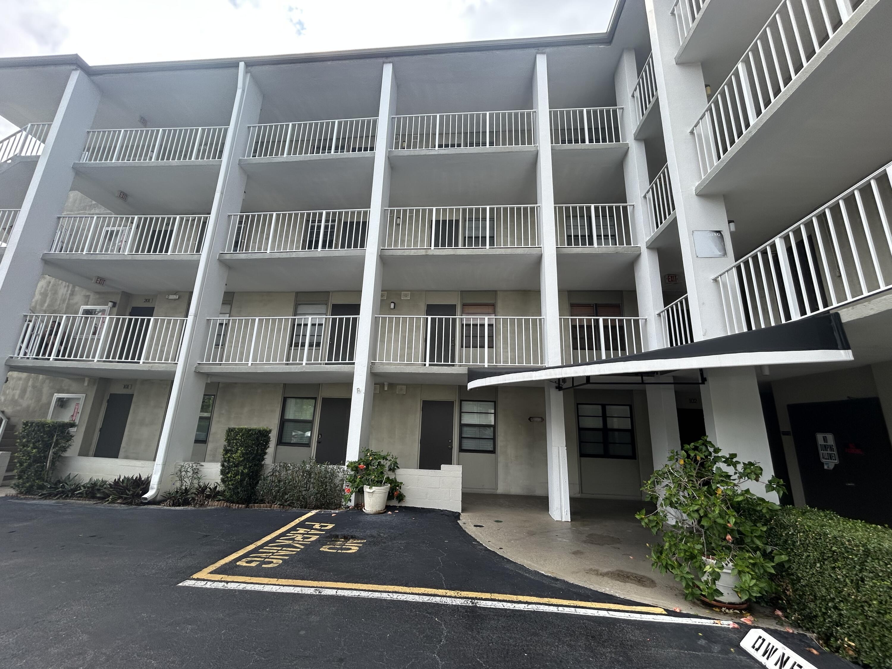 501 Southwest 11th Place, Unit 402A Boca Raton, FL 33432 - Photo 2 of 29 Building closeup from parking lot