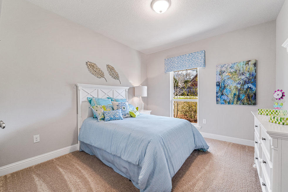 231 Conner Circle Santa Rosa Beach, FL 32459 - Photo 14 of 19 a bedroom with a bed and a window
