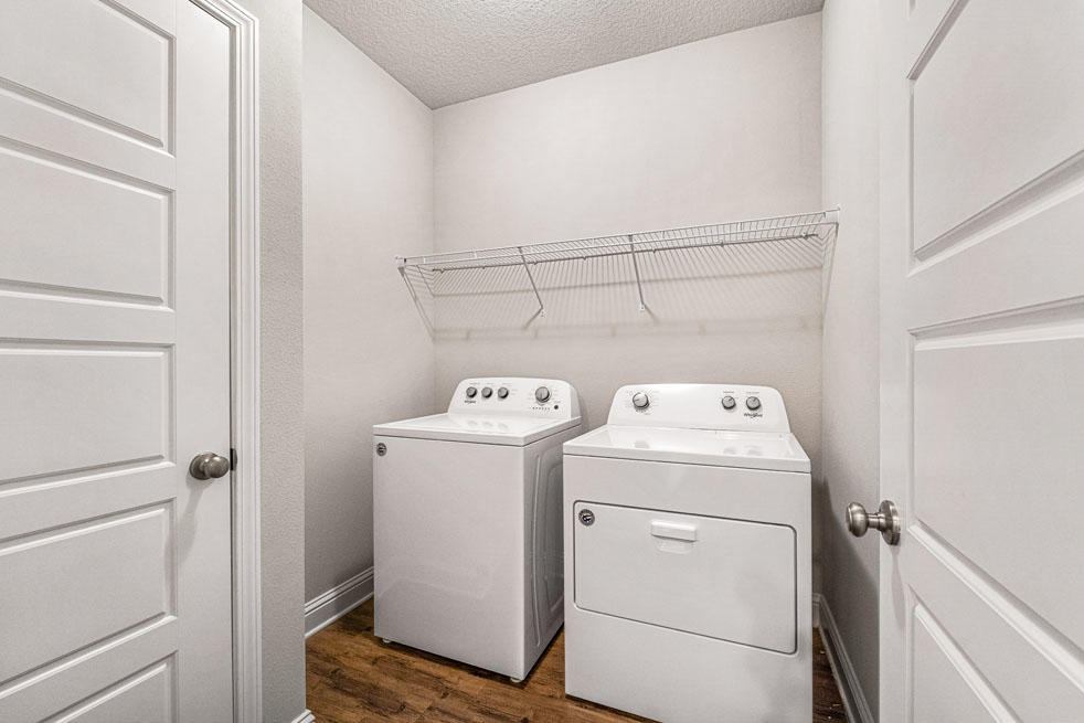 231 Conner Circle Santa Rosa Beach, FL 32459 - Photo 19 of 19 a utility room with dryer and washer