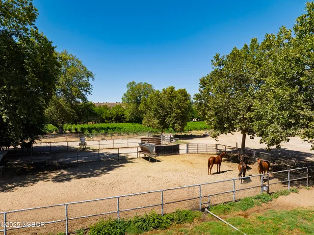 a view of a swimming pool with a lake view