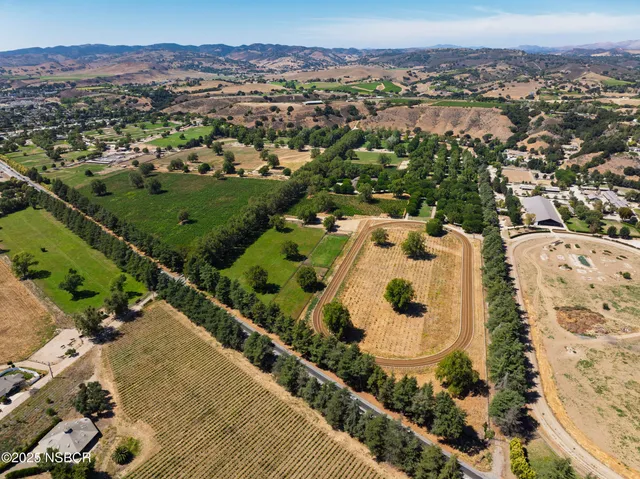 a view of a swimming pool with a lake view