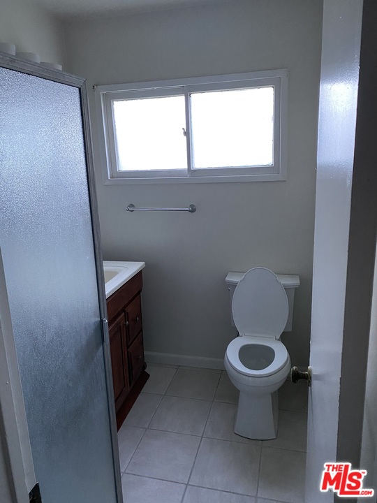 202 Spieth Way Riverside, CA 92507 - Photo 10 of 16 a bathroom with a toilet and a sink