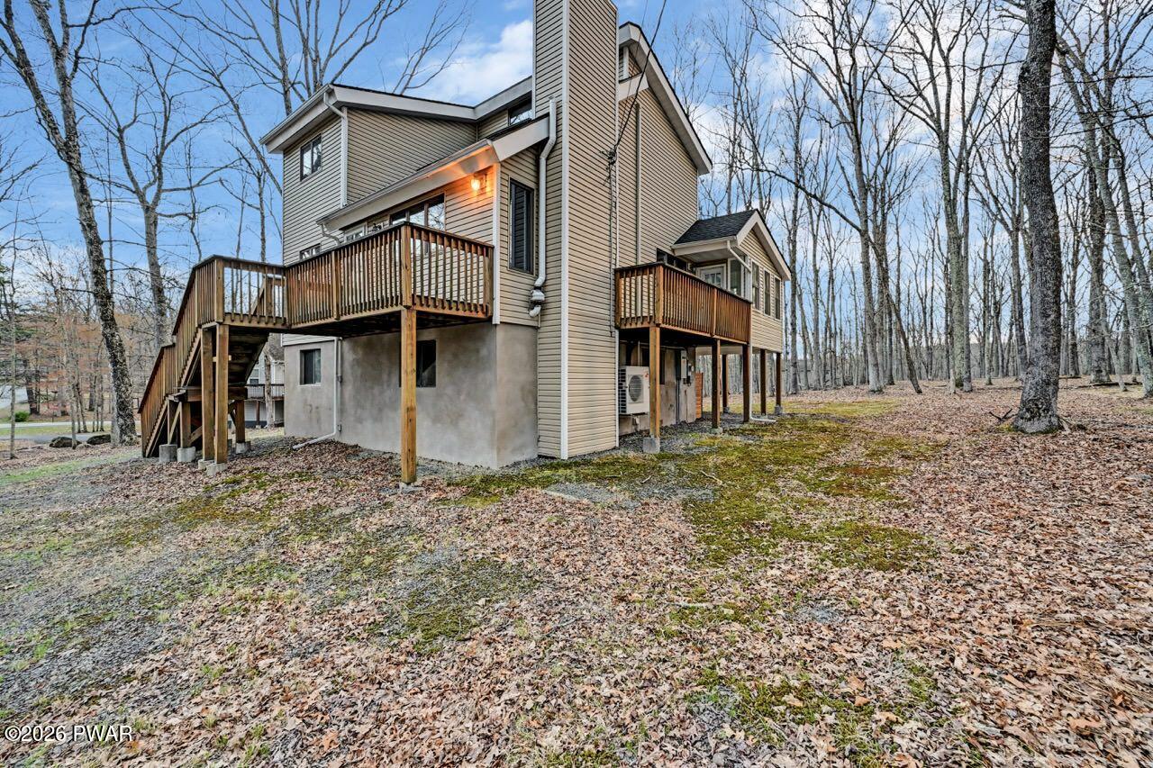 258 Lakeview Road Lackawaxen, PA 18435 - Photo 111 of 119 a house with trees in front of it