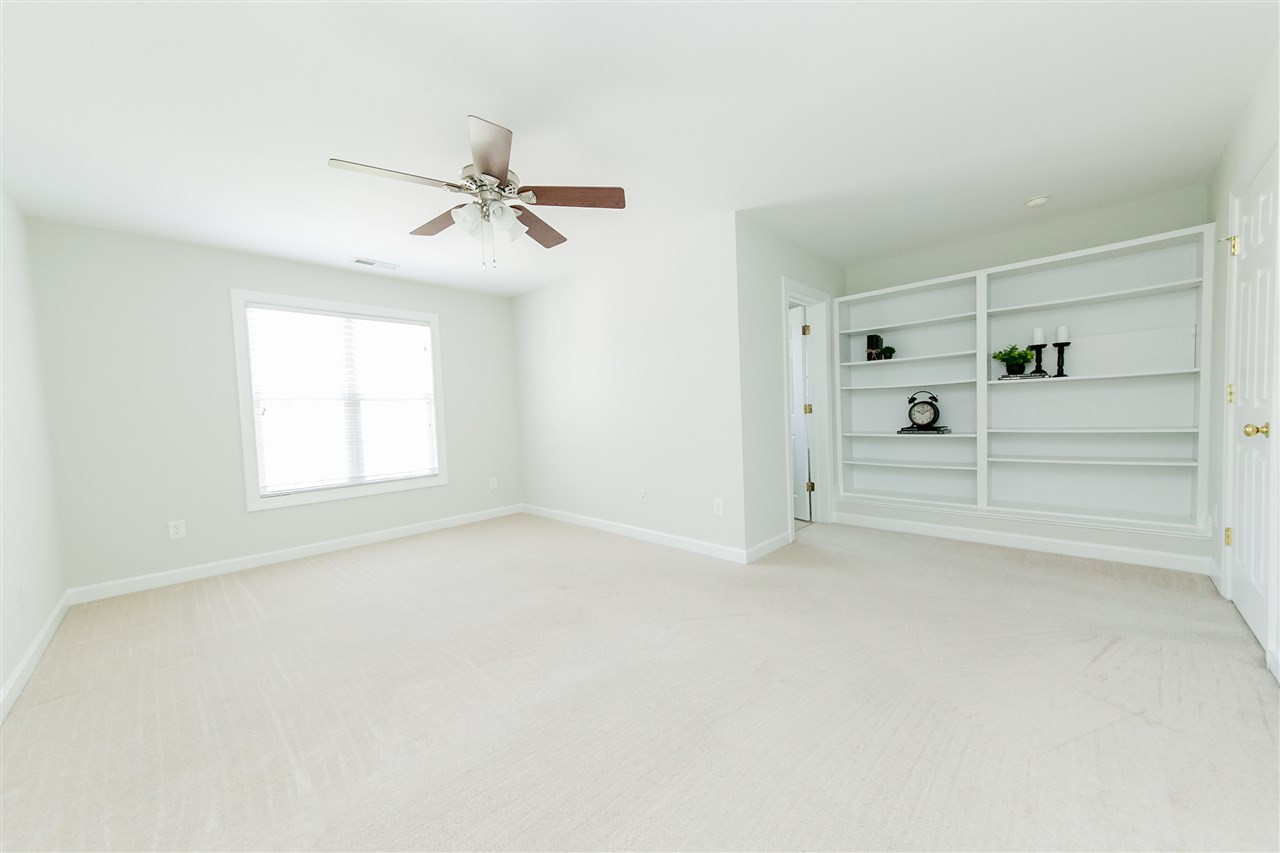 4675 Pooh Corner Drive Raleigh, NC 27616 - Photo 5 of 10 LARGE master bedroom- plenty of space for a king size bed! Great built-ins for extra storage/display area. Master Bedroom