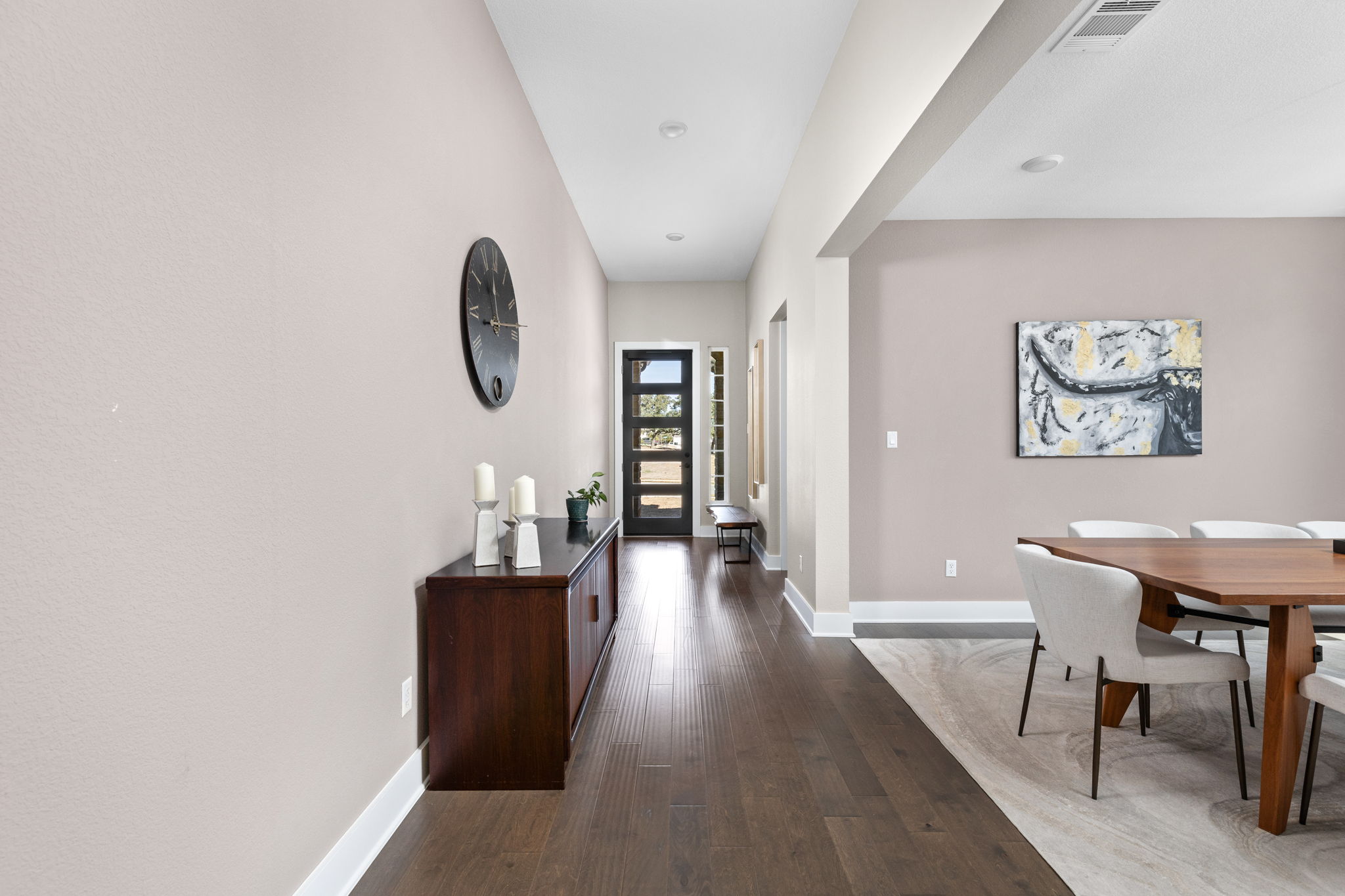 829 Pink Granite Boulevard Dripping Springs, TX 78620 - Photo 2 of 30 Welcoming foyer with elevated model-home finishes and an open, airy feel.