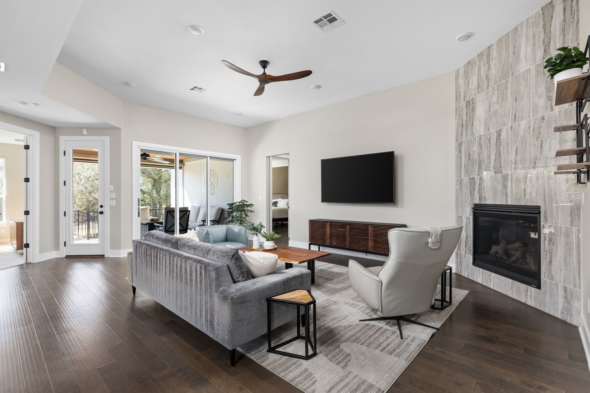 829 Pink Granite Boulevard Dripping Springs, TX 78620 - Photo 4 of 30 Oversized 9x8 sliding glass doors bring the outdoors in.