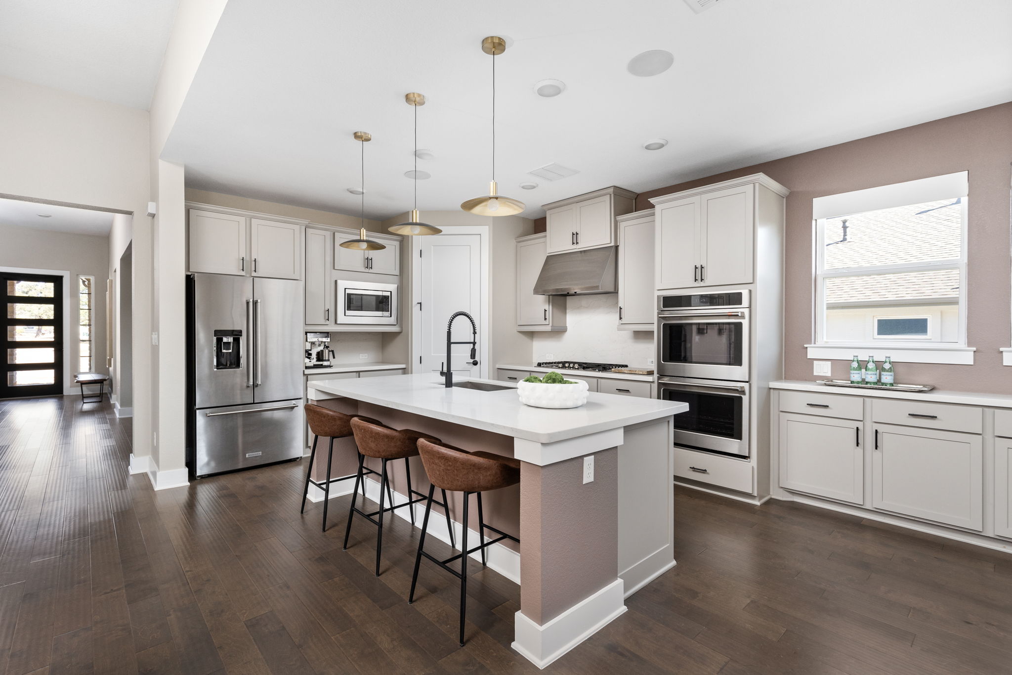 829 Pink Granite Boulevard Dripping Springs, TX 78620 - Photo 7 of 30 Extensive cabinetry provides exceptional storage.