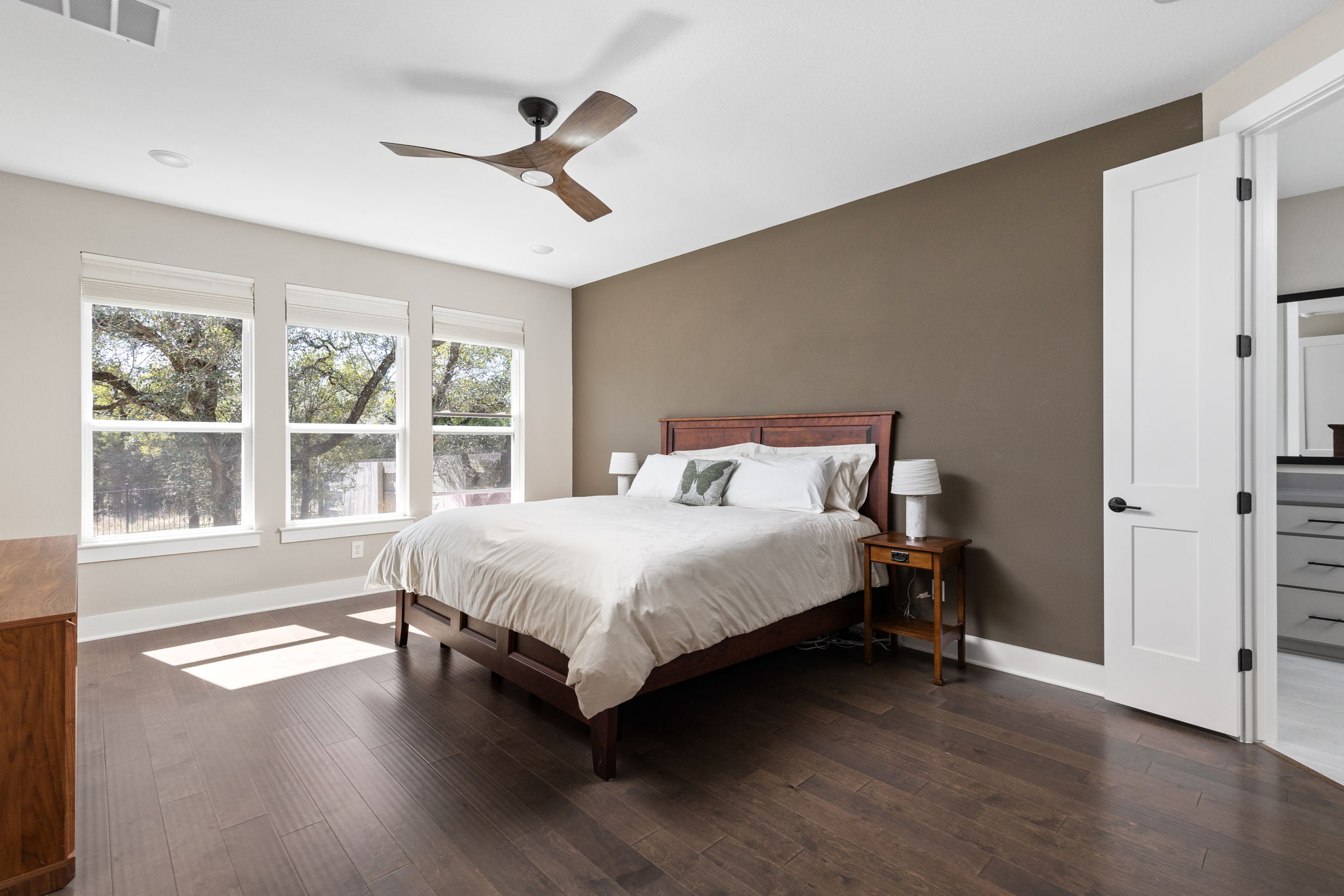 829 Pink Granite Boulevard Dripping Springs, TX 78620 - Photo 10 of 30 Spacious primary suite designed as a true retreat.