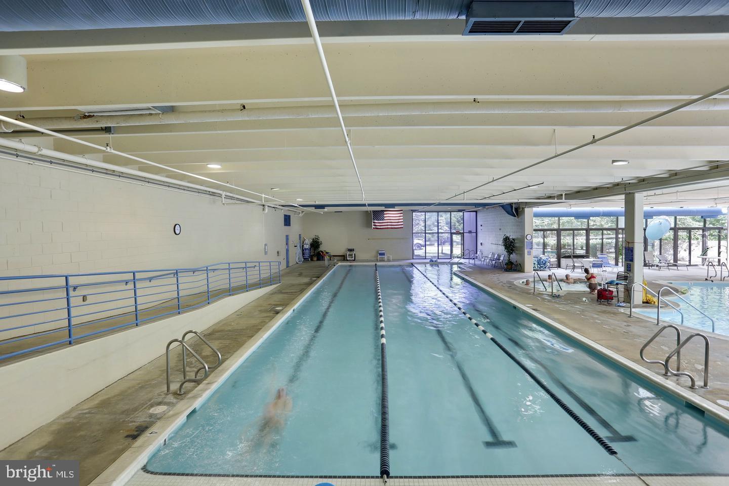 3330 North Leisure World Boulevard, Unit 5109 Silver Spring, MD 20906 - Photo 30 of 44 Indoor swimming pool with natural light.
