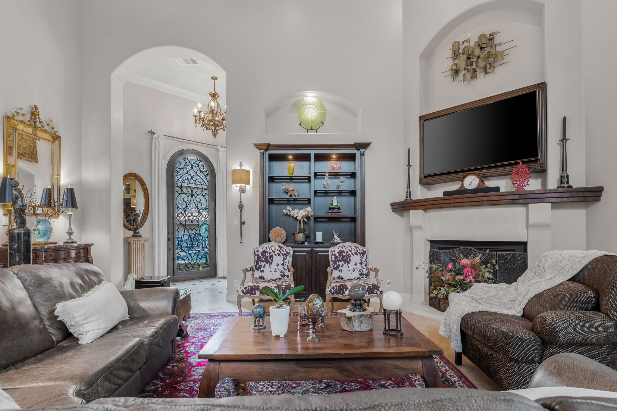 1901 Sea Eagle View Austin, TX 78738 - Photo 14 of 39 Living room with a high ceiling and arched walkways