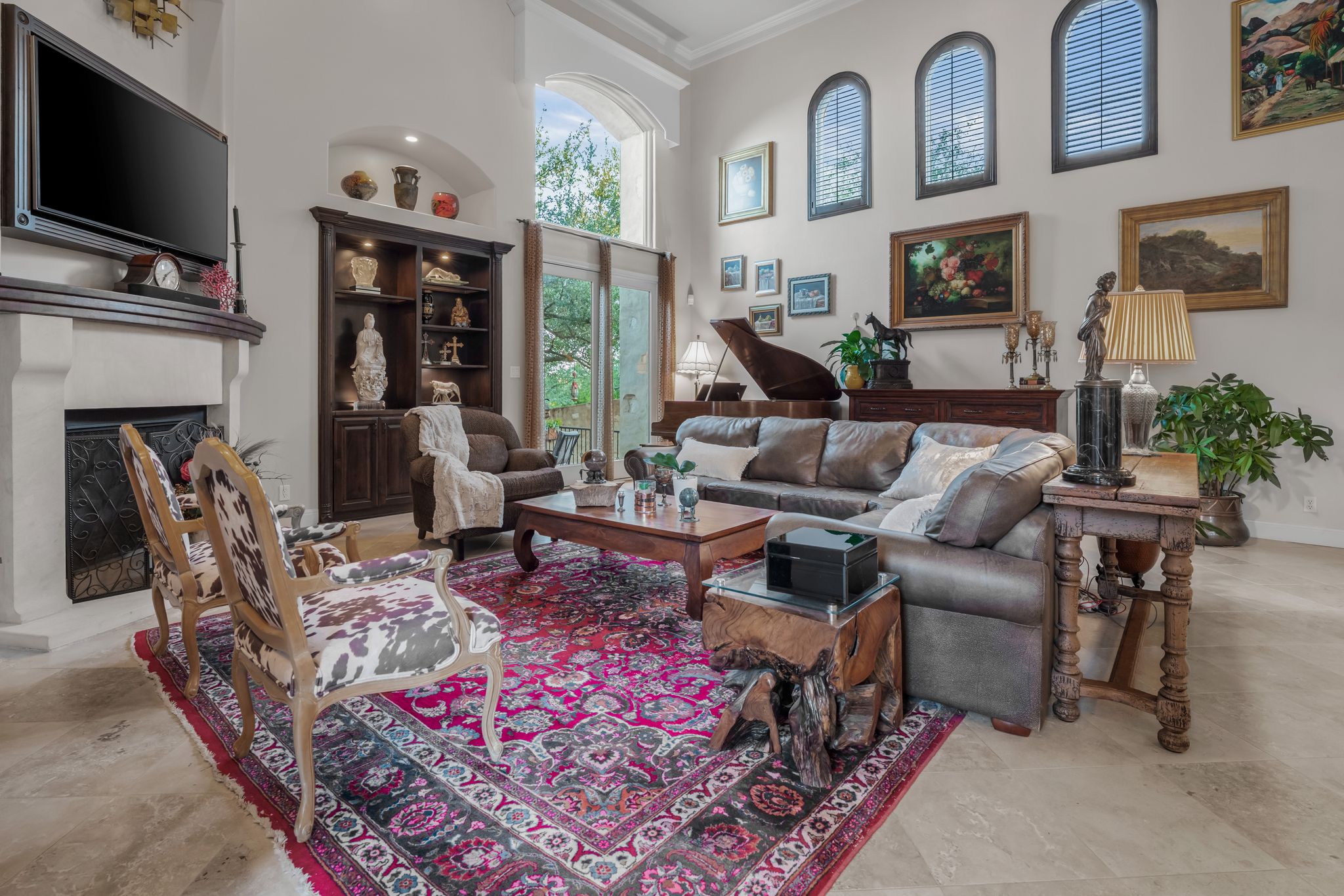 1901 Sea Eagle View Austin, TX 78738 - Photo 15 of 39 Living room with a high ceiling and arched walkways