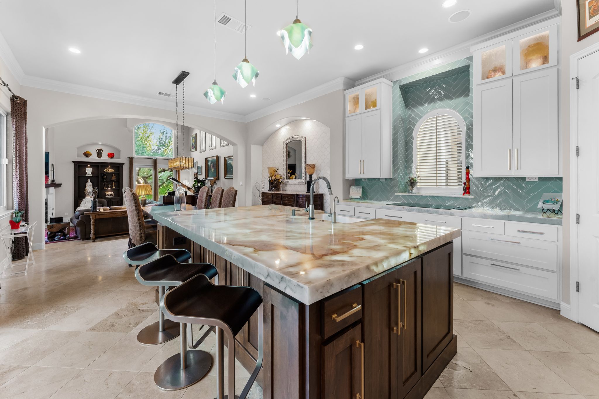 1901 Sea Eagle View Austin, TX 78738 - Photo 16 of 39 Kitchen with a kitchen island with quartzite countertops completed in 2024