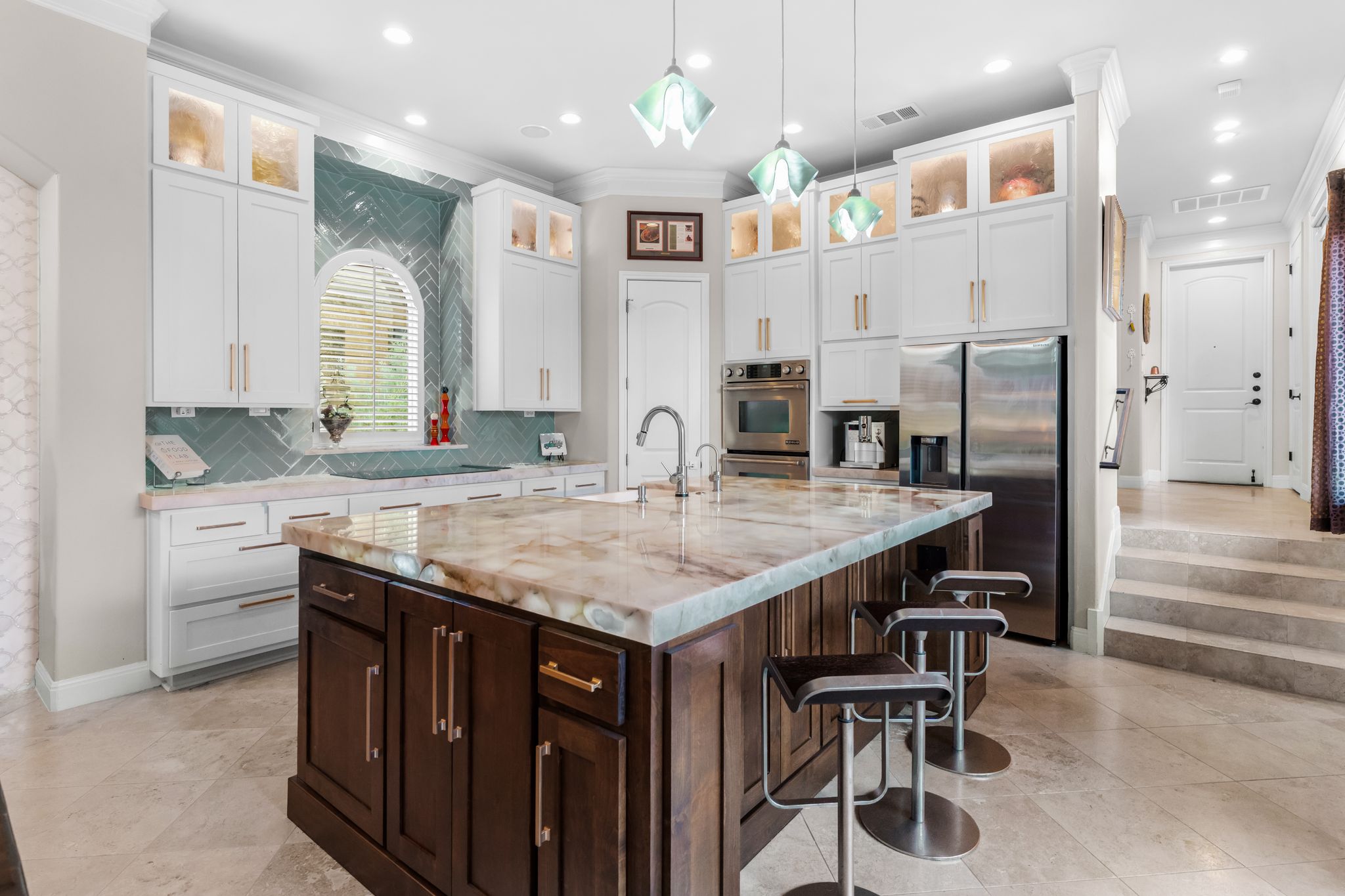 1901 Sea Eagle View Austin, TX 78738 - Photo 17 of 39 Kitchen with a kitchen island with quartzite countertops completed in 2024