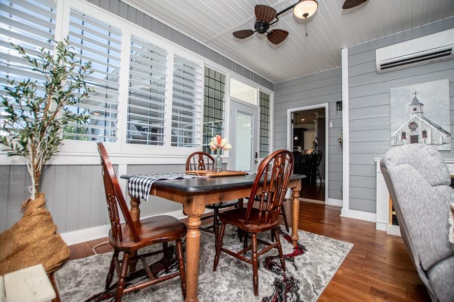 575 Liberty Church Road Carrollton, GA 30116 - Photo 28 of 95 a view of a dining room with furniture window and wooden floor
