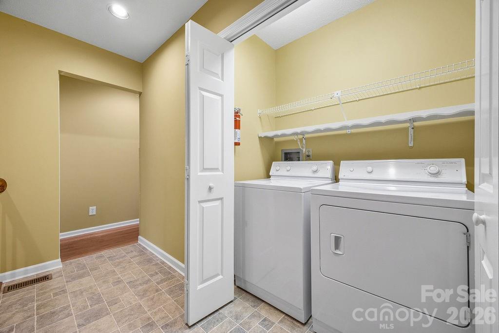 3100 Cove Loop Road Hendersonville, NC 28739 - Photo 30 of 43 a utility room with dryer and washer