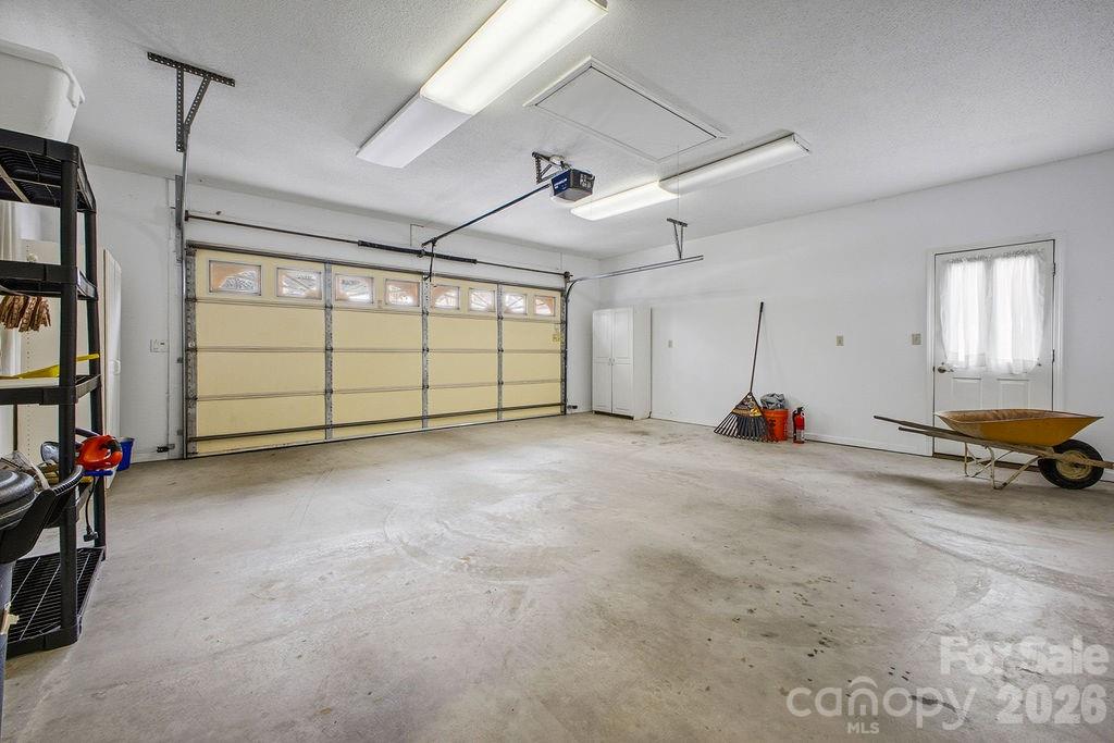 3100 Cove Loop Road Hendersonville, NC 28739 - Photo 31 of 43 a view of a garage with rack and bicycle