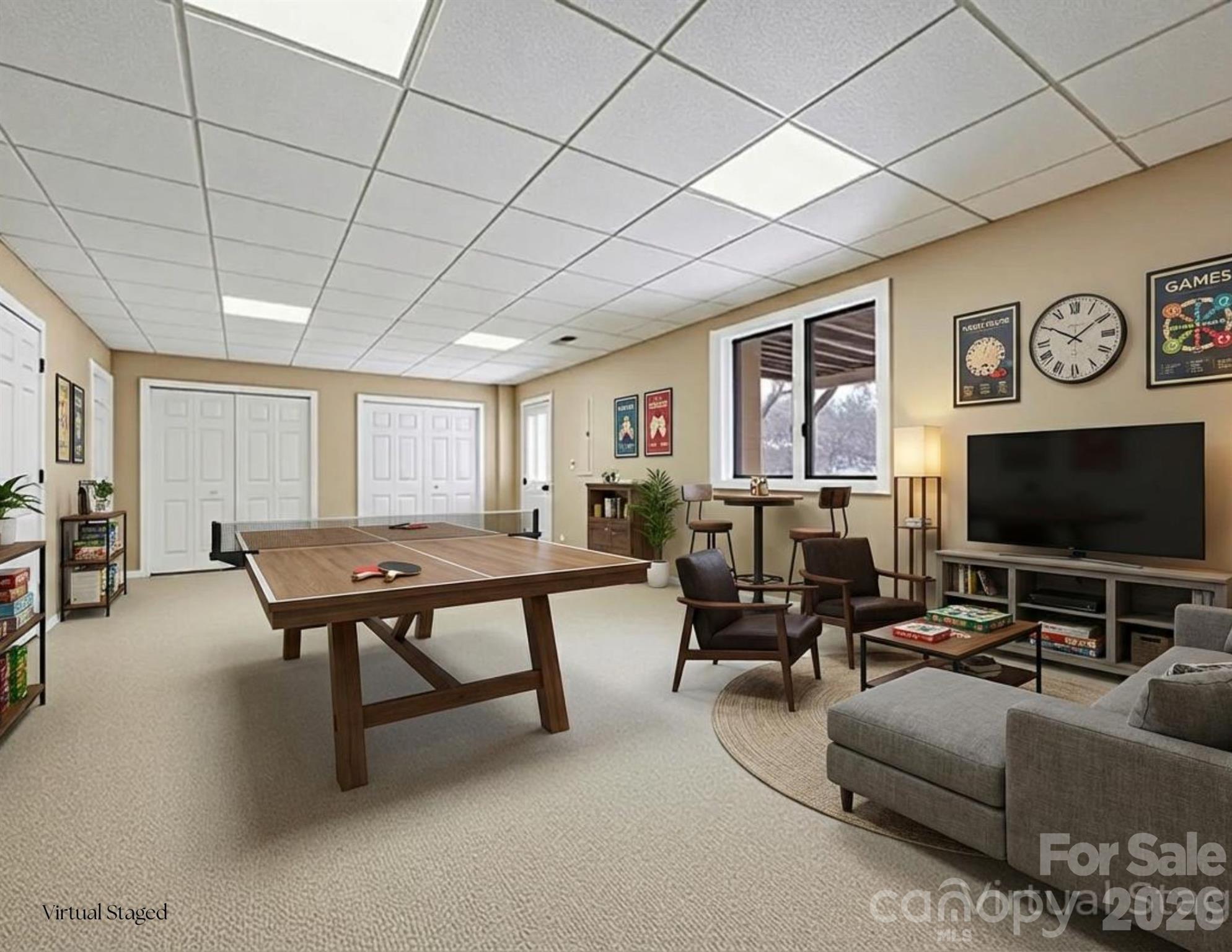 3100 Cove Loop Road Hendersonville, NC 28739 - Photo 32 of 43 a living room with furniture and a flat screen tv