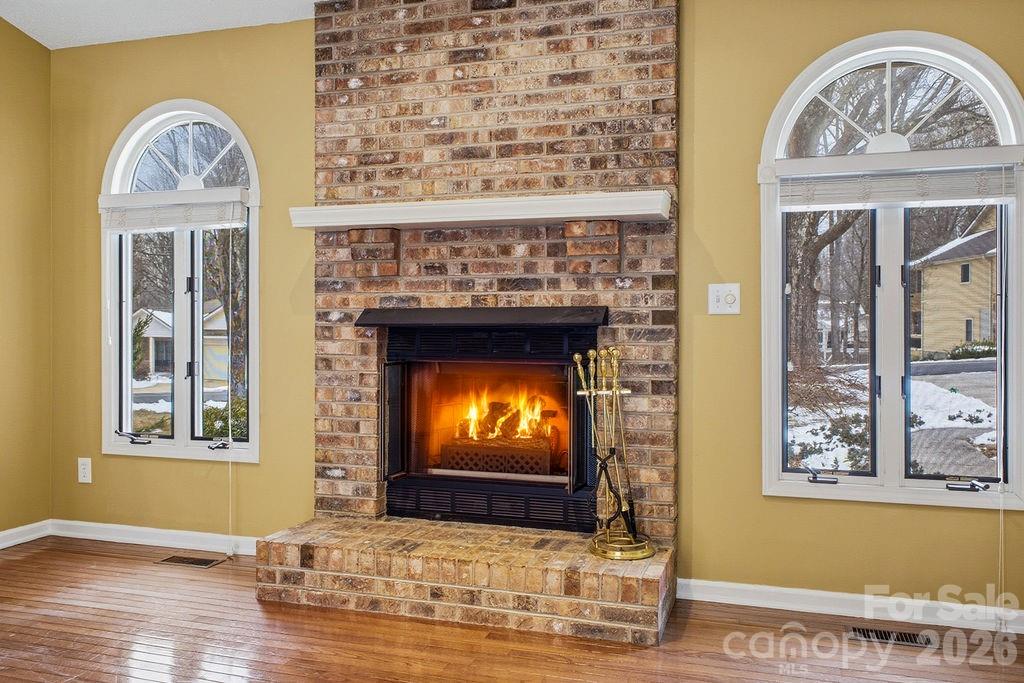 3100 Cove Loop Road Hendersonville, NC 28739 - Photo 9 of 43 a view of fireplace with wooden floor