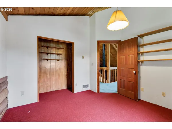 a view of a backyard of the house