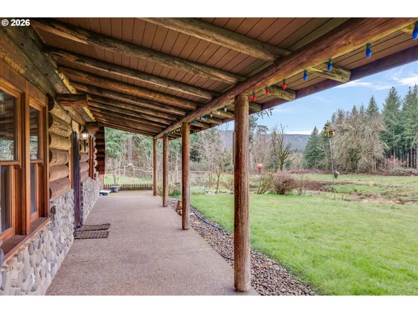 a view of backyard with a garden and entertaining space
