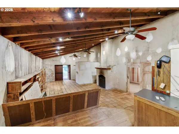 a view of an empty room with a window